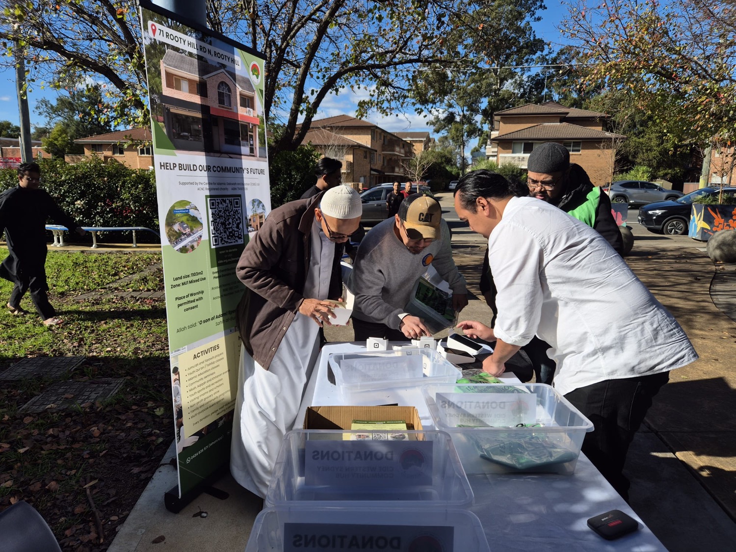 Worshippers giving generously at the Penrith & Kingswood Jumu'ah fundraiser